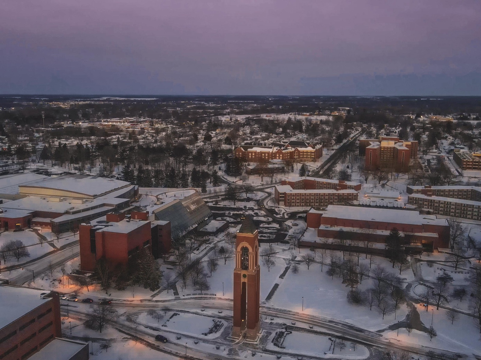 Snowy Ball State campus from the air at dusk