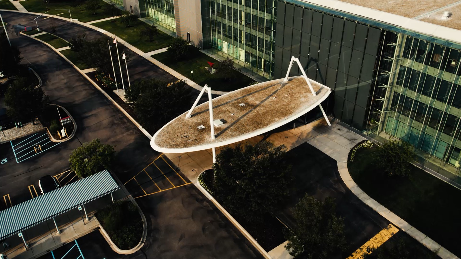 Drone shot of the Yazaki building and its oval canopy