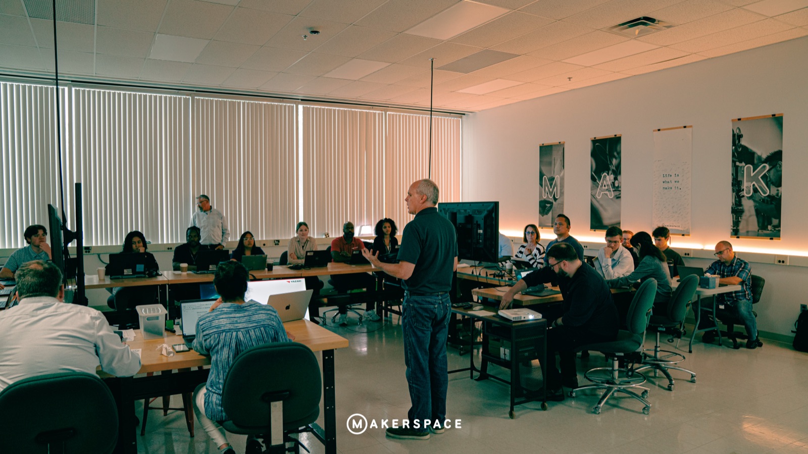 Instructor walking a full room through CAD